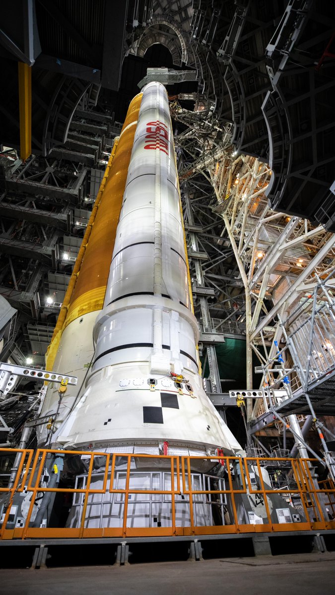 In this view looking up in High Bay 3 of the Vehicle Assembly Building at NASA’s Kennedy Space Center in Florida, all of the work platforms that surround the Artemis I Space Launch System and Orion spacecraft are fully retracted.
