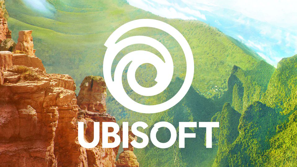 A rocky, orange canyon gives way to mossy green rolling hills cascading from the distance into the foreground. A Ubisoft logo in white is above the scene.