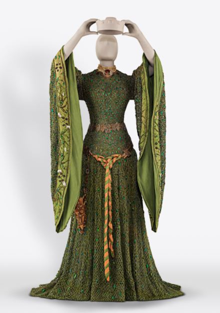 Did you wear green for #StPatricksDay?

This shimmering emerald dress was worn by famous actress Ellen Terry in her role as Lady Macbeth. It's embellished with green iridescent beetle-wing cases, designed to glisten under stage lights.