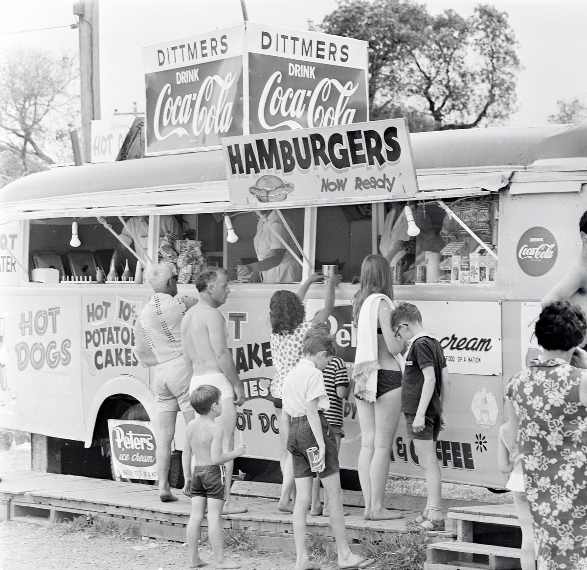 Was this your beach? A queue forms at a kiosk on an unidentified Melbourne beach in 1969. What was your go to order?

NAA: A1200, L79755