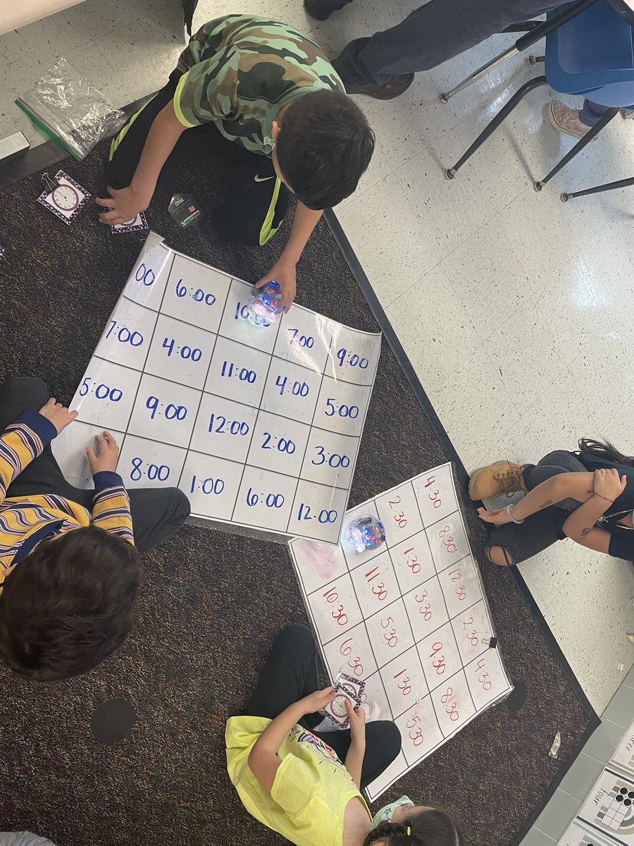 mrschelsiegrant's tweet photo. The firsties in @madswall1st &amp; @bretcko_teach classroom are SO SMART 🧠! These ladies modeled targeted small groups and engaging station rotations. One station was independently coding the BlueBots to match the analog and digital time ⏰. Amazing work! @SullyES_LCPS @LCPS_Math https://t.co/xoMClegZES