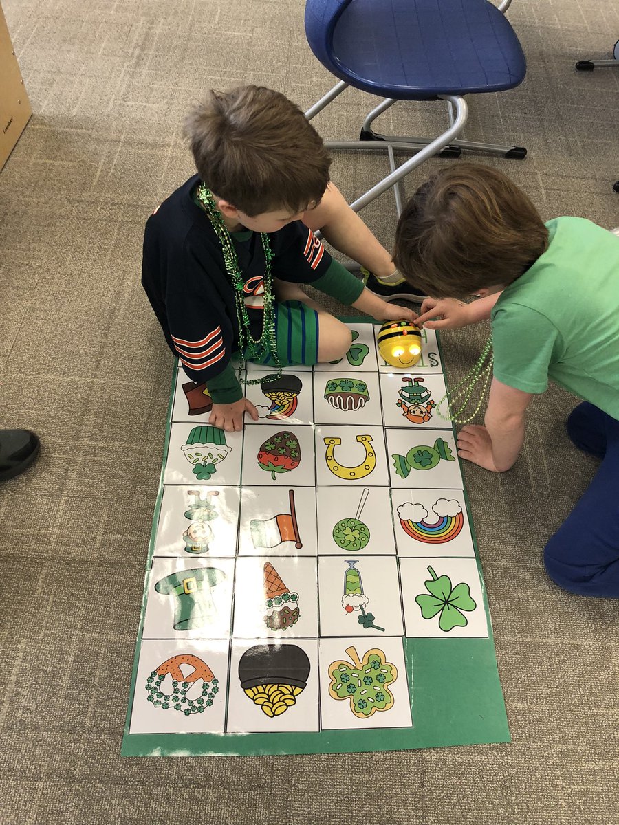 Busy St. Patrick’s Day at Everett Library!  Kinders use number and word recognition to find 10 sneaky leprechauns in our courtyard.  Firsties code the bee bots to find some fun Irish paths!