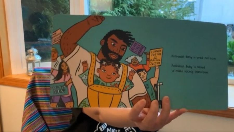 aimeeterese's tweet photo. Edmonds School District, Seattle, Family and Community Engagement Officer reading Kendi's "Anti-racist Baby" on their Facebook account. https://t.co/OQPPmQULVk