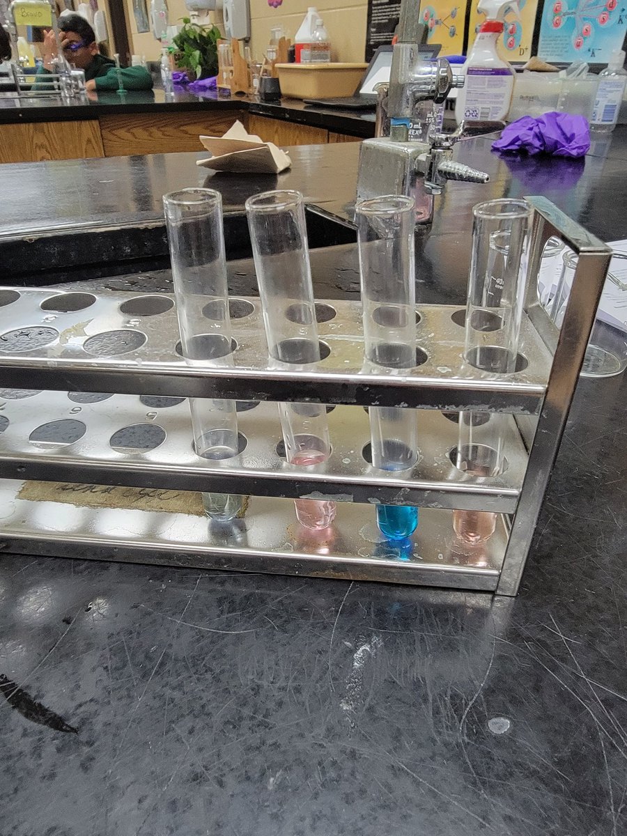 Scrivner101's tweet photo. Today in chemistry we go to observe Le Chatelier's Principle in action. They made a reaction shift to relieve a stress they applied to a reversible reaction. You could tell the reaction had shifted because the forward reaction made blue products and the reverse reaction made pink https://t.co/OxhdqGWFOv