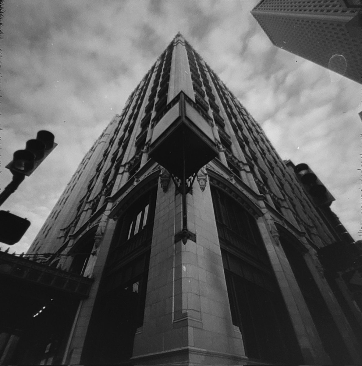 kevincampphoto's tweet photo. Upwards at the historic art deco Philtower in downtown Tulsa from 4th and Boston Ave.. Ilford Delta 100, Zero Image 2000, devd in D23. #city #architecturephotography #pinhole #pinholephotography #pinholecamera #ilfordphoto #stenope #negativepositives https://t.co/oF39vVAb6a