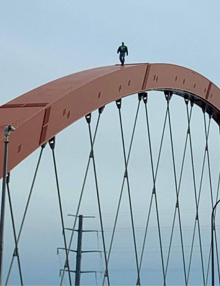 SEMFireNews's tweet photo. ICYMI: Earlier today a male climbed the Hastings arch bridge over the Mississippi River. Male made it down safely and officers made contact with him. 

Photos from MNDot camera and a passerby. https://t.co/imQODZZYJM