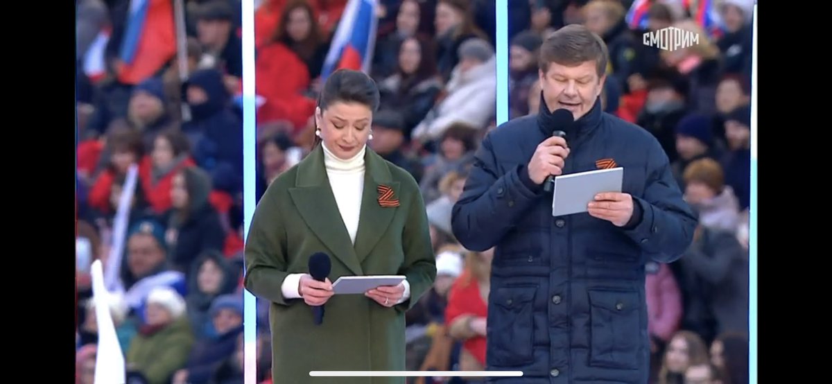 Dmitry Guberniev is best known as Russia’s unbelievably positive, hyperactive TV biathlon commentator. Now here he is introducing the leader of a Donbas separatist battalion