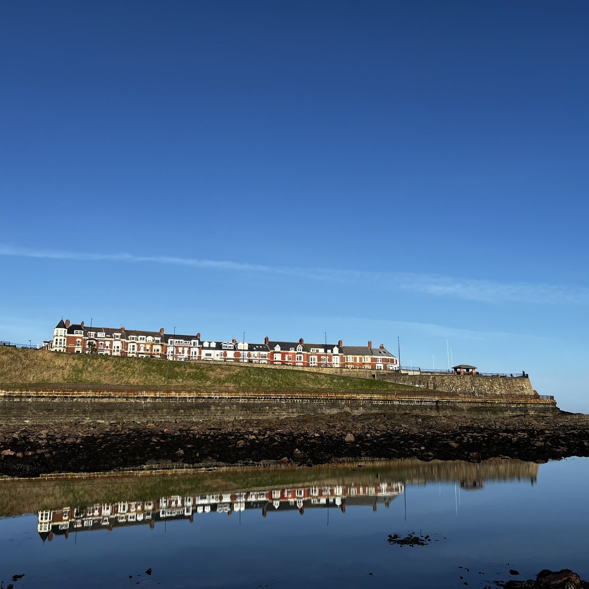 I captured this panorama just before the breeze disturbed the water. #cullercoats #cullerfornia #whitleybay