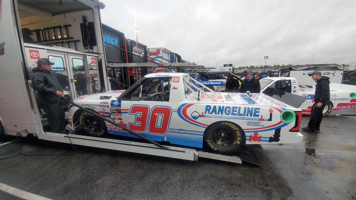 OnPMotorsports's tweet photo. After a soaking wet start to the day we FINALLY unloaded our #30 #Rangeline #30 #Toyota @amsupdates

@tate_fogleman @NASCAR_Trucks
#NASCAR #FR8Auctions200 #ZMAXRaceProducts https://t.co/kb71fI8T1b