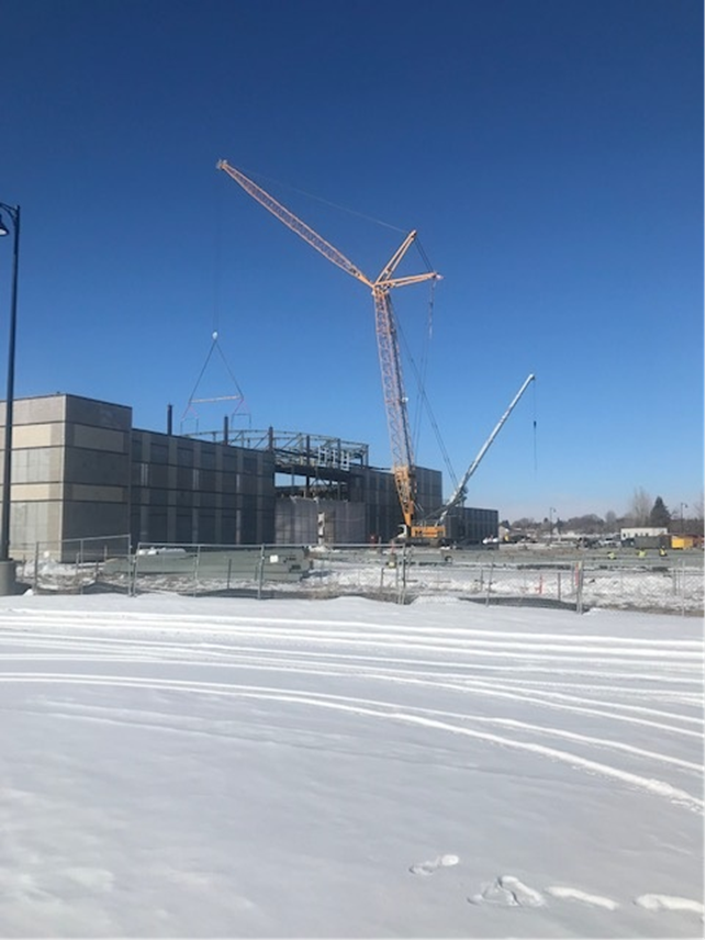 HoganCMGC's tweet photo. Hogan loves building event centers that support recreational activities! In February, Hogan, Bateman-Hall, and subcontractors used a 320-ton crane to place large trusses at the Mountain America Center in Idaho Falls! https://t.co/PhB4EA1yYQ