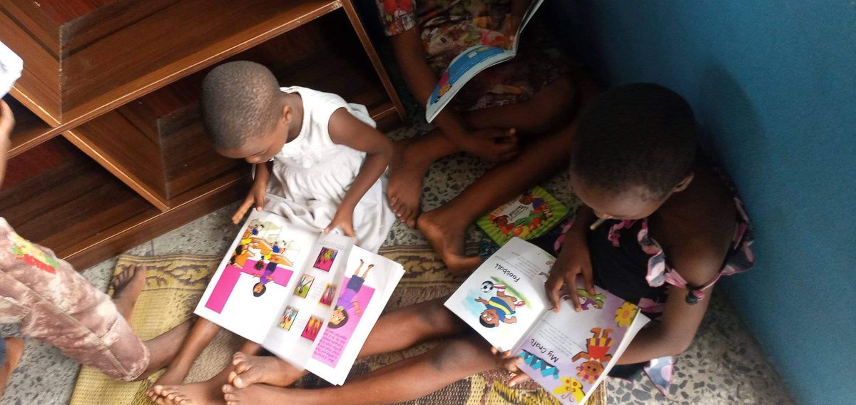 AyaFubaraEneli's tweet photo. If you contributed to the #EmmaJohnsonDirigoWari I honor you. When you see these kids reading/listening to books being read to them, think, where would they be and what would they be doing if this library didn’t exist? You’re a lifesaver. Thank you.❤️#OpoboLibraryInitiative https://t.co/UxVgmTn15X