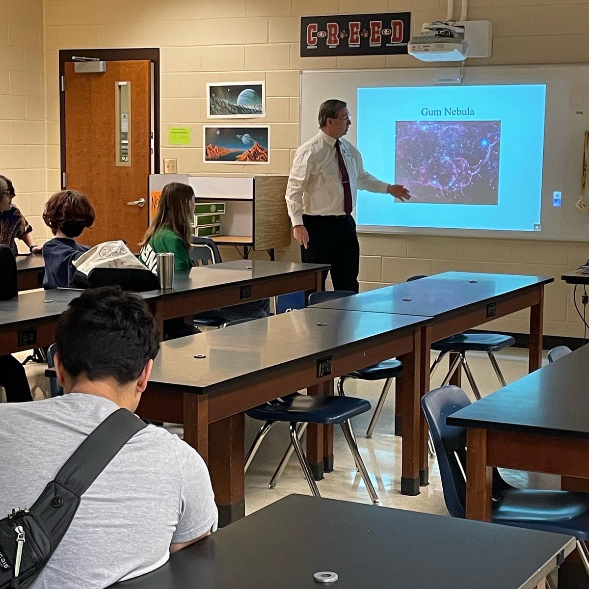 MrsBPaul's tweet photo. Many thanks to Dr. Jim Sowell from @GeorgiaTech for visiting my class to talk about supernovas! Touching a moon rock was a bonus! https://t.co/iw5O4BS2y9