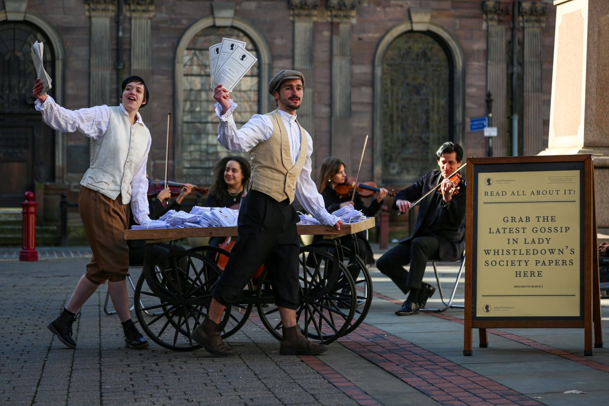 NetflixUK's tweet photo. To celebrate the new social season, a special edition of Lady Whistledown's notorious Society Papers were handed to the townsfolk of Manchester! https://t.co/6O4FJVKGRd