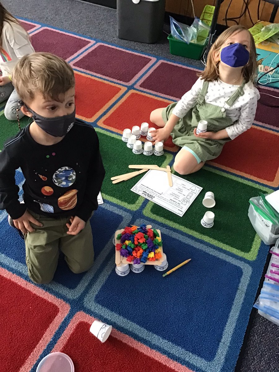 A few more pictures of students working on our STEM challenge today!