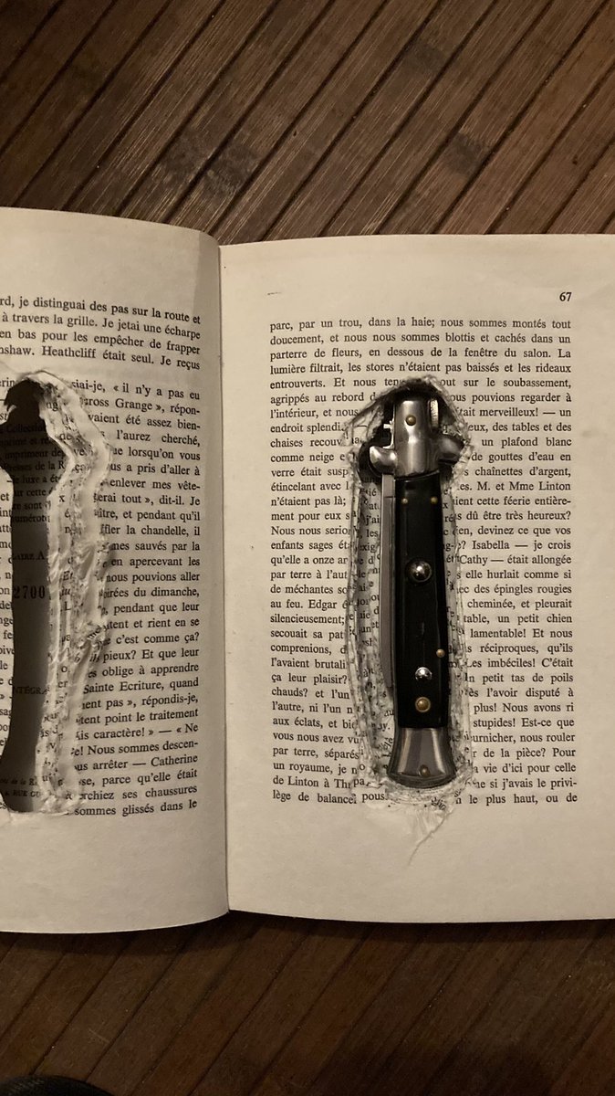 blind_cyclop's tweet photo. @guardian Opened an old french version of Wuthering Heights but i apparently tried to hide a knife in it. Good old booze. Is it about the Mafia ? https://t.co/Ll18ytDqgB