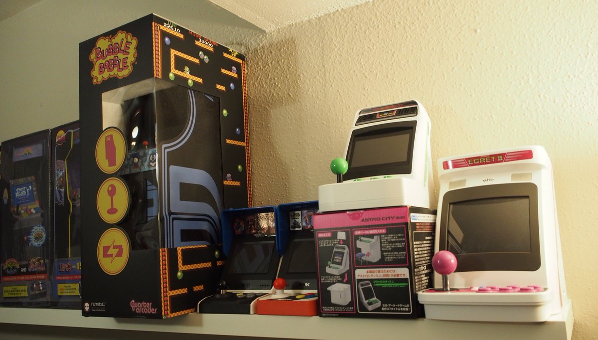 EastXTwitch's tweet photo. I finally installed a shelf for my mini arcade cabinets! We'll improve the layout over time, but it's great to finally have a place to display these. #AstroCityMini #TaitoEgretIIMini #NeoGeoMini #Replicade #QuarterArcade #MyArcade #HomeArcade https://t.co/MQFiSplMA6