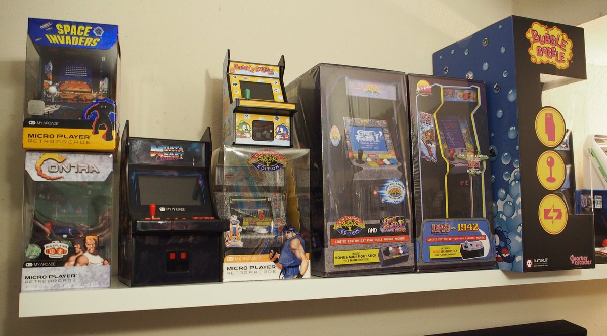 EastXTwitch's tweet photo. I finally installed a shelf for my mini arcade cabinets! We'll improve the layout over time, but it's great to finally have a place to display these. #AstroCityMini #TaitoEgretIIMini #NeoGeoMini #Replicade #QuarterArcade #MyArcade #HomeArcade https://t.co/MQFiSplMA6