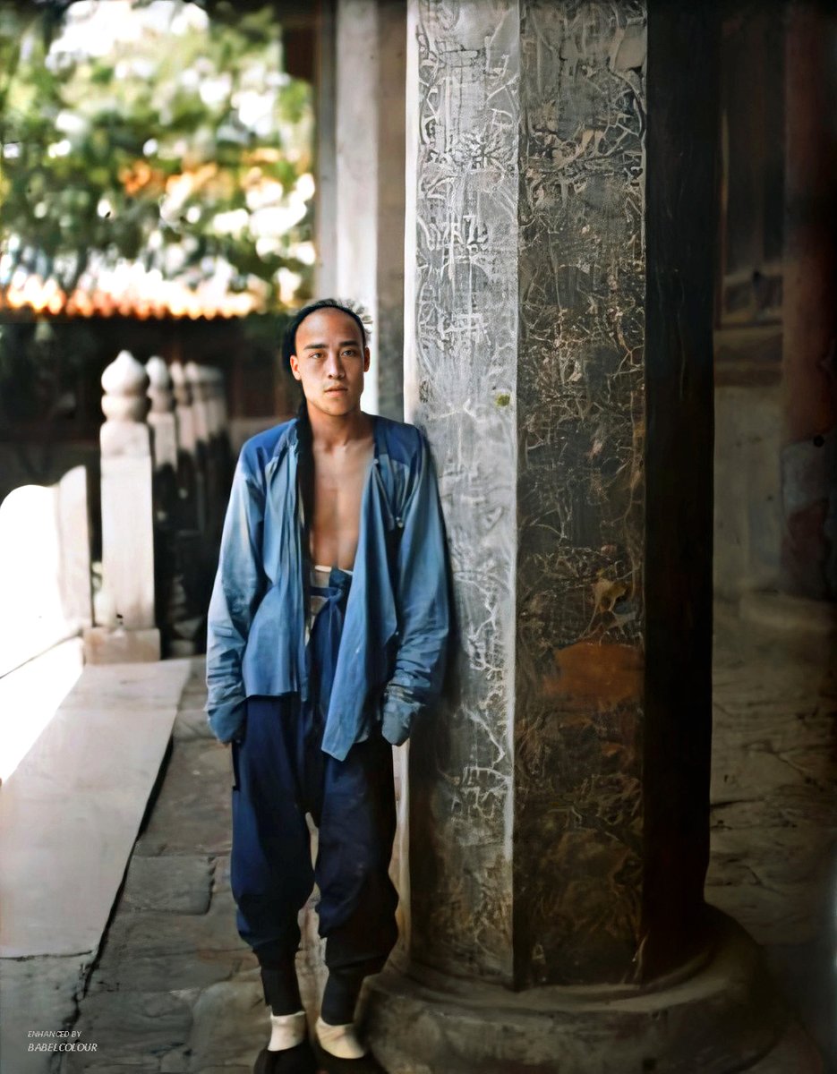 StuartHumphryes's tweet photo. The youth of today! Visiting the Temple of Confucius in Qufu, China, this lout just slouched around with his shirt hanging out. Not like in the good old days. Oh, hang on, this was taken 110 years ago. They *were* the old days! (an original colour photo from 1913, not colourised) https://t.co/UtWJIfieXk
