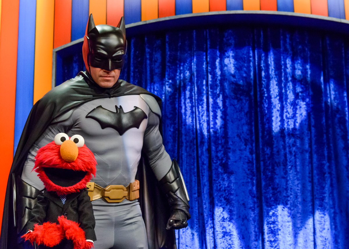 Elmo loves you, Batman! Next time you visit the #NotTooLateShow can you tell Elmo how to get an Elmo-Signal like yours? Ha ha ha!