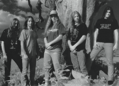dbmagazine's tweet photo. Obituary "The End Complete" photo shoot, circa 1992. Photo by Tim Hubbard taken from Decibel Books’ new 328-page hardcover "Turned Inside Out: The Official Story of @obituarytheband!" In stock and shipping now!

💀 https://t.co/CbnIXJKT29

#TurnedInsideOut #Obituary #deathmetal https://t.co/w0U27vFzCg