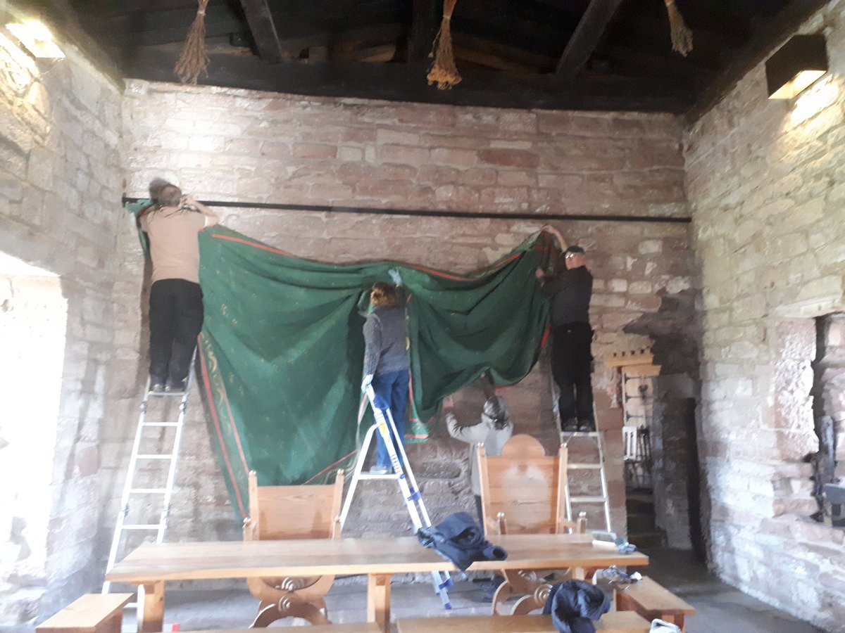 wallcurator's tweet photo. Our volunteers did an amazing (and very dusty) job today helping the conservator and I take down, clean, and re-hang the replica wall coverings at the Castle. Thank goodness it was sunny outside to shake them out! #curatorlife #somuchdust #volunteers #conservation https://t.co/5a201OZZkX