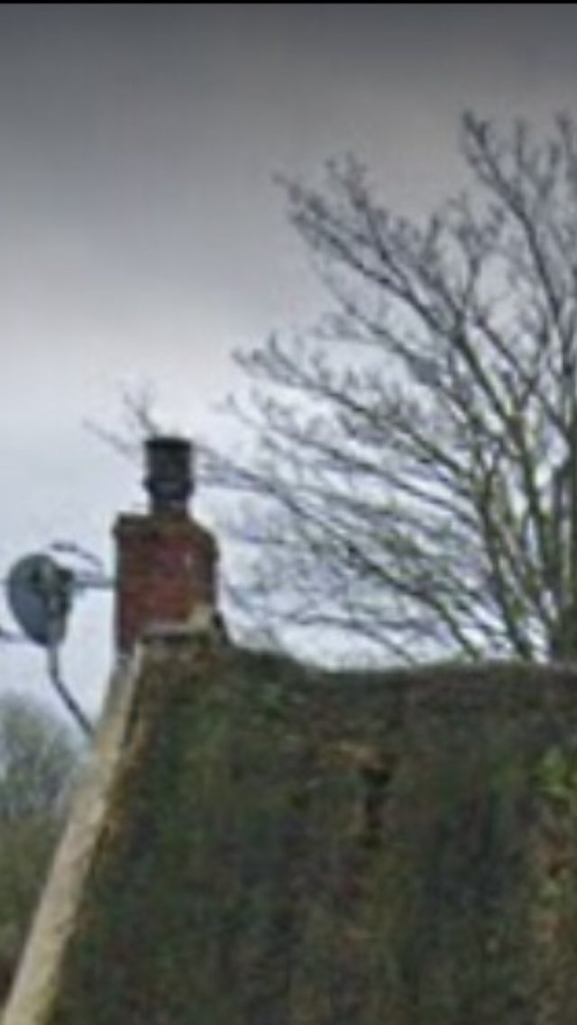 thatchertaggart's tweet photo. A genuine Irish Bog Oak thatched Scraugh/Sod roof, damaged due to the lack of a thatching specification by @CommunitiesNI Historic Environment Division. The purlins at one gable have rotted away &amp; collapsed, there should be a sign saying “enter only,with brave utensils” #scraw https://t.co/CmF4oMdHHL