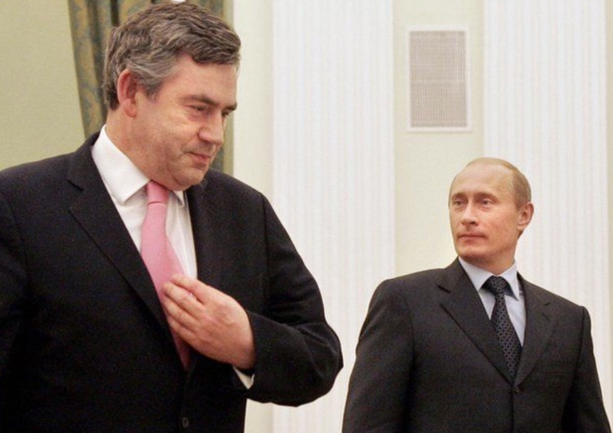 This picture from 2006 on BBC News today. Is Putin really small? Or was he just very young back then?