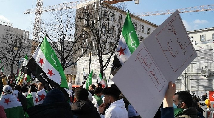 Osmannarfat's tweet photo. A demonstration in #Berlin today 19.03.2022 in front of the Russian embassy, on the eleventh anniversary of the Syrian revolution.
#StopPutin #StopAssad https://t.co/Jl8vKm6yff