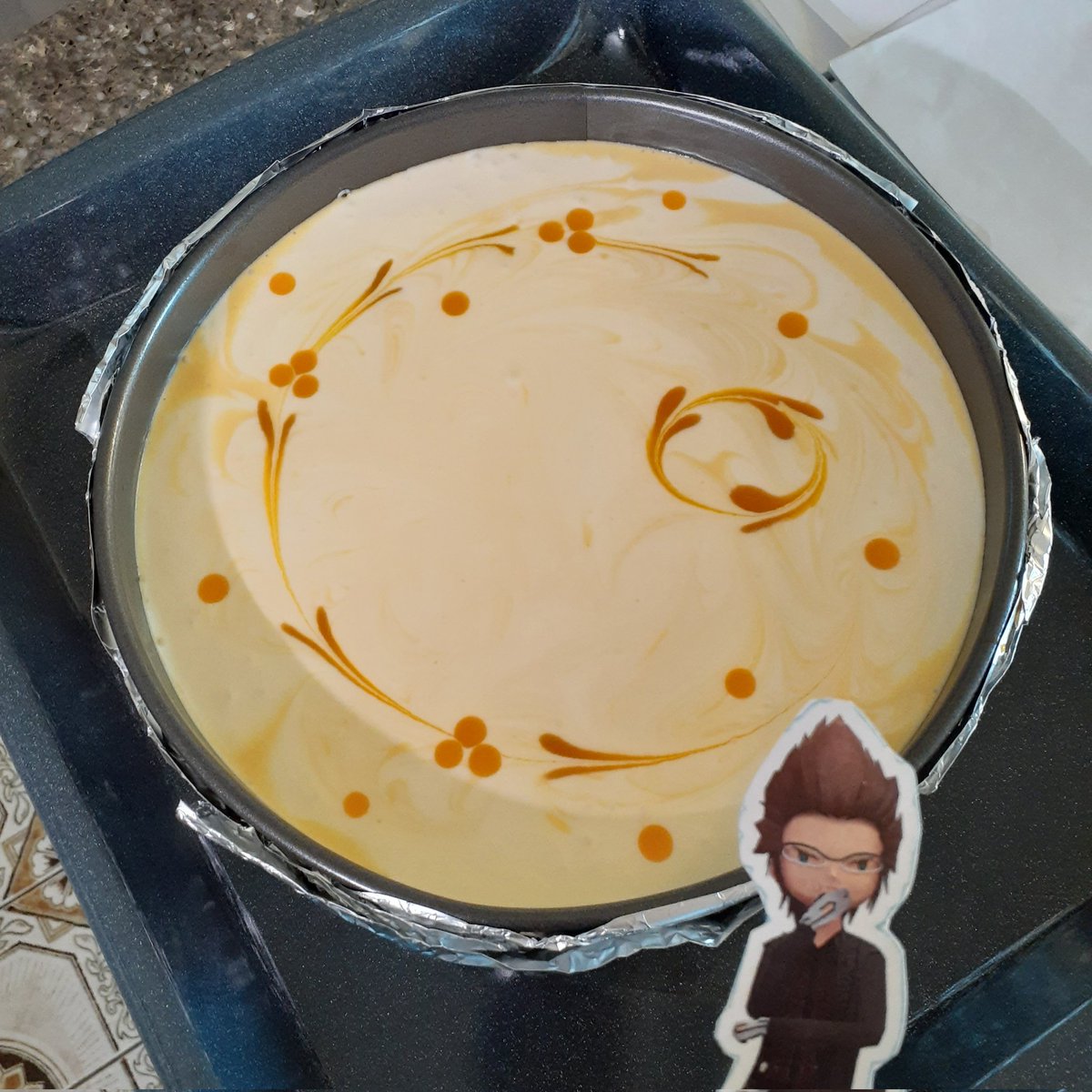 FinalKingdomXV's tweet photo. Mango marble cheesecake. Originally had that delicate design but I decided to cover it since I had extra mango slices and pulp. #nofilter #BakingAssistantPocketIgnis 🥭 https://t.co/mffPqhjB7v
