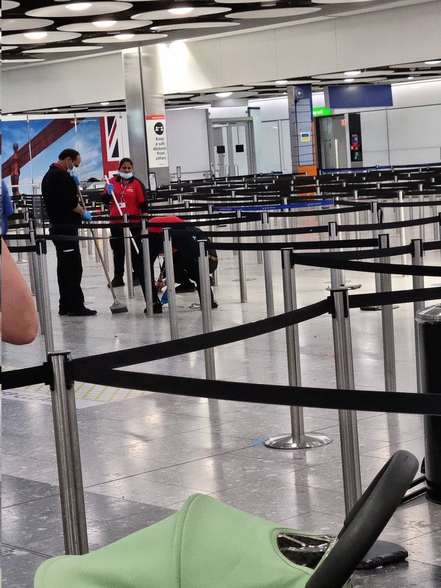 ag0437's tweet photo. @HeathrowAirport is short staffed so we had to wait 30mins on stand to disembark, then 1hr+ for our bags. Thankfully there are spare staff to scrape the COVID social distancing guidance off the floor. Good luck getting us to fly again if this is how you treat us. #priorities https://t.co/3A8dYvwSNn
