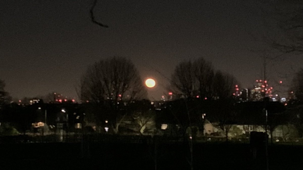Amazing orange #moon and view of central London tonight