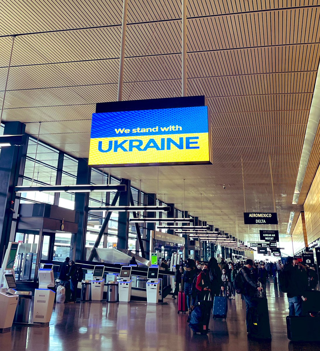 Airport sign “we stand with Ukraine”