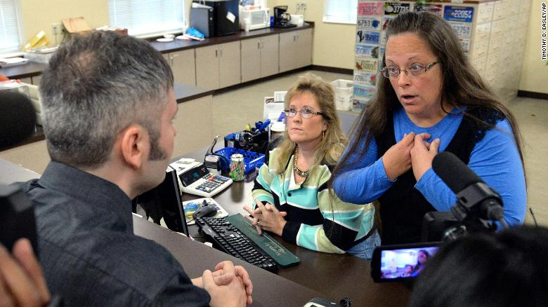 A federal judge said Friday that former Kentucky county clerk Kim Davis violated two same-sex couples' constitutional rights when she refused to marry them while in office in 2015.
#KimDavis #Karma  #Justice  #DontSayGay