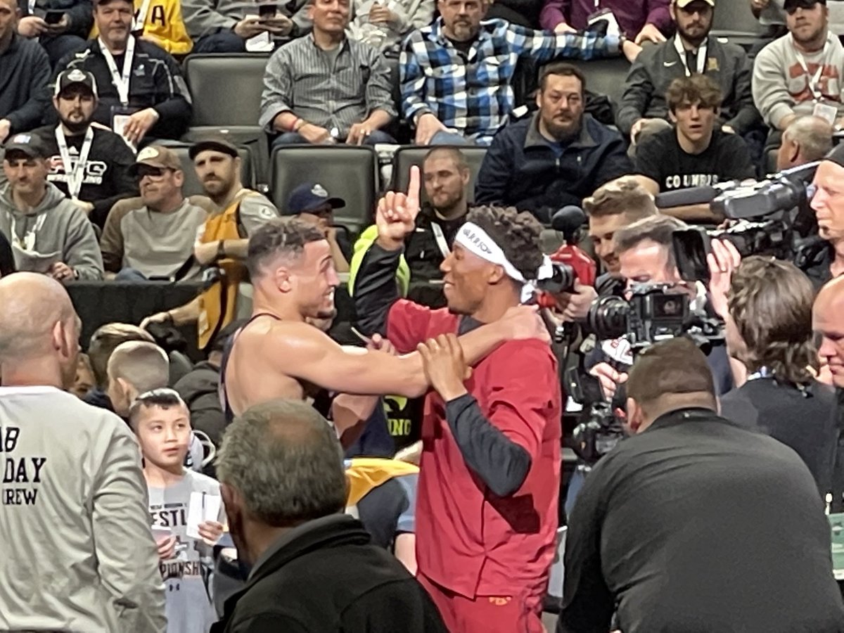 Aaron Brooks’s buddy David Carr comes over to celebrate Brooks’s title at 184, pointing to the sky as the fellow Christian student athletes share an #NCAAWrestling moment