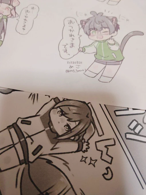 差し入れにねこてたちを貼っていく 