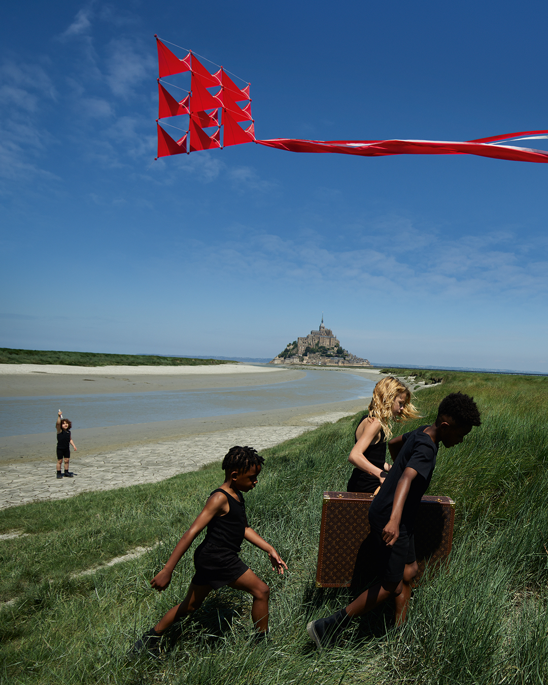 Louis Vuitton on X: Gleeful delight. With its unique aesthetic and  historic monuments, France's Mont Saint-Michel serves as the backdrop,  welcoming a group of children to frolic on the shoreline. Discover the