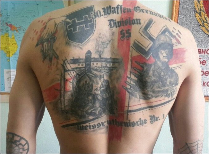 Romanthetruth's tweet photo. So all those guys with swastika tattoos are now the good guys, so long as they're backed by the West? Or do we pretend they don't exist? https://t.co/sMddHHSgUx
