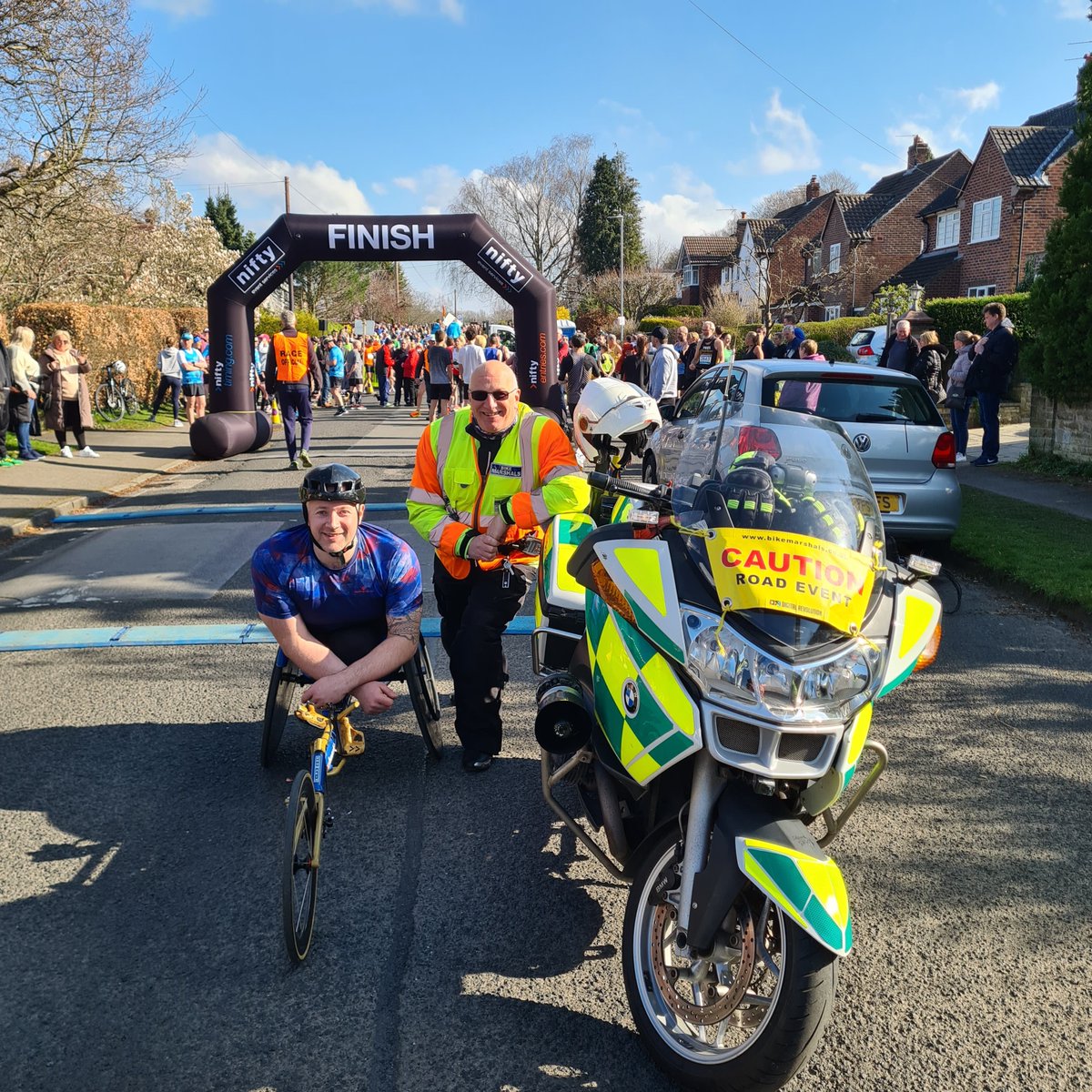 bikemarshal's tweet photo. Our Moto Gary at the @WilmslowRunFest with wheelchair athelete Stuart Bloor whom he escorted on the 10k race. It was an honour to be involved with this event.@catmarshal #wewatchyourback #safetyatevents https://t.co/g7rYLxn826