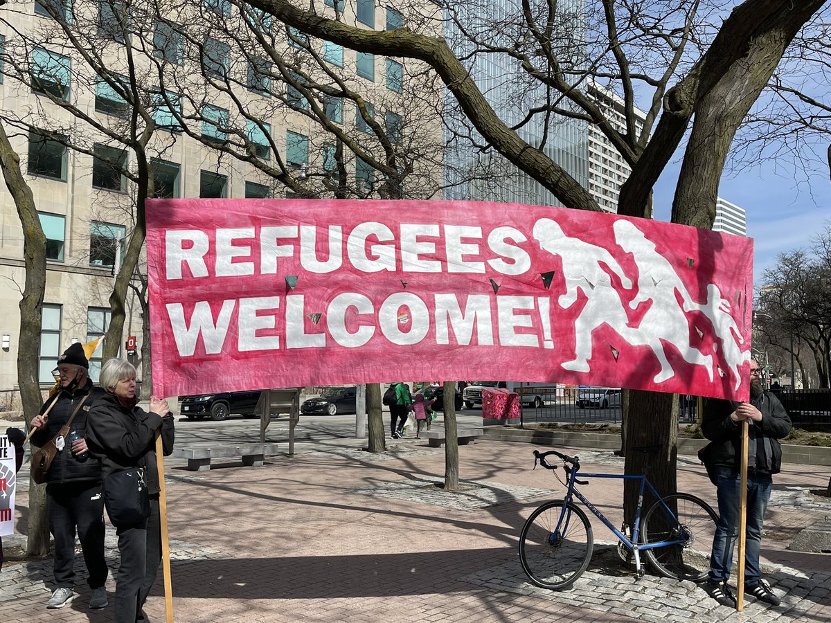 torontolabour's tweet photo. The signs are out and the message is clear at #CommunitySolidarityTO https://t.co/dOl6R81bXY