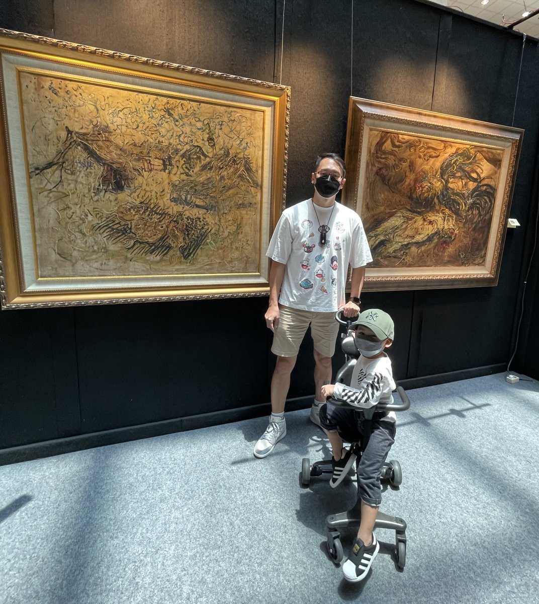 rayshearer's tweet photo. The two paintings behind me is a masterpiece from Indonesia’s Legendary painter, Affandi. Cost around 44ETH (1 ETH =$2900) at the time I tweet this or both paintings equal to 1 @BoredApeYC. Amazing! Which one would you rather have? 😍 #Affandi https://t.co/KFqxKFcdsu