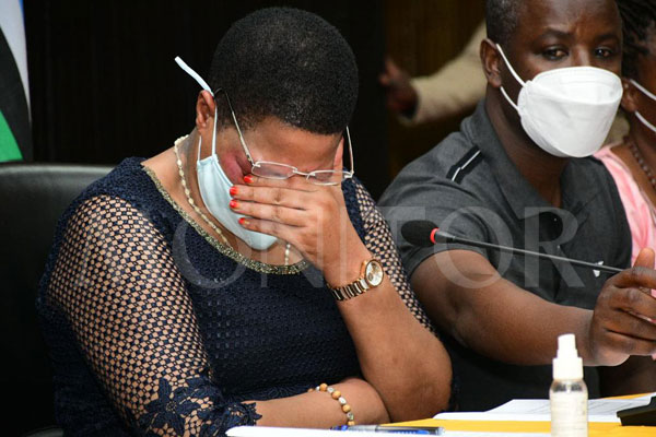 DailyMonitor's tweet photo. PHOTOS: Deputy Speaker @AnitahAmong reacts as she, alongside PM @RobinahNabbanja, Govt Chief Whip @Thomas_Tayebwa and other MPs/govt officials update journalists about the death of Speaker Jacob Oulanyah at Parliament on March 20, 2022.
#MonitorUpdates 
📸@DavyLubz https://t.co/IWTIuHyEZF