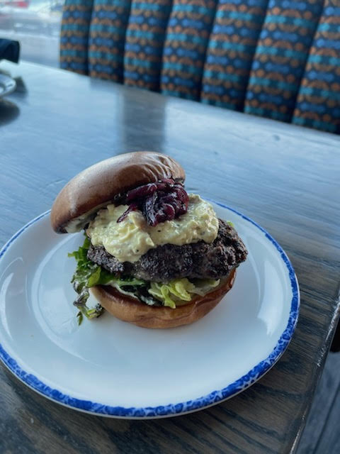 DowntownStJohns's tweet photo. Let’s #DevourDowntown! 
@SJFX_709 presents: SJFX Surf and Turf Burger🍔
6oz beef patty w/ crab hollandaise, red onion pepper marmalade, &amp; greens on a toasted brioche. W/ Ziggy's fries.

Deets @ https://t.co/BcYchKoELz
 #DTBurgerBattle2022 https://t.co/x5fG06ehny