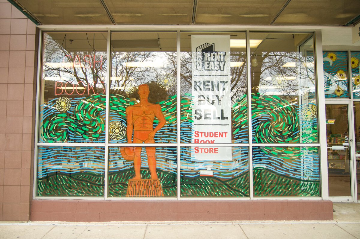 DowntownEL's tweet photo. We can’t get over this @michiganstateu inspired window art at Student Book Store! 🤩

This art piece was painted by @sbsmsu employee, Holly. Holly painted these MSU landmarks from the inside of the store— meaning she painted them all in reverse! Awesome job! 👏 https://t.co/rc2VogNUbm