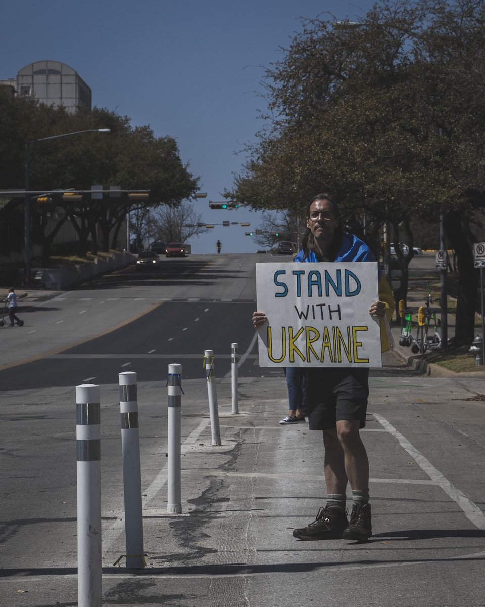 whatisgleb's tweet photo. “Putin is the new Hitler. He’s killing women and children.”

Sharp words about the conflict in #Ukraine outside the Austin capitol today https://t.co/zX6gmMIUHK