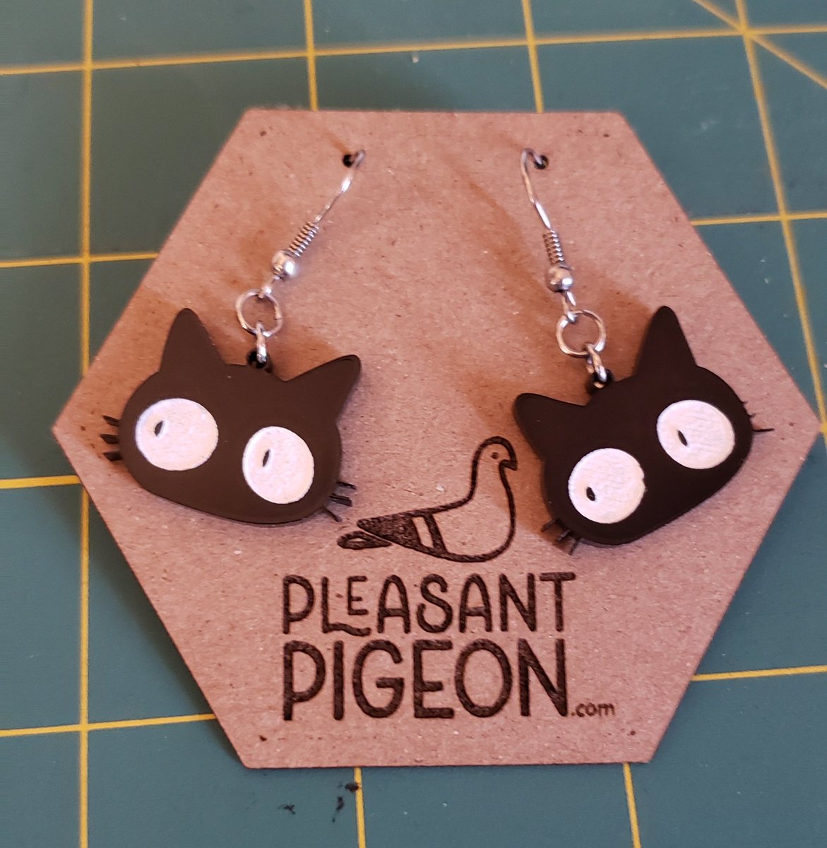 Getting ready to start some sh!%. Online shop starting in April! #flcl #glowforge #lasercut #anime #cats #earrings