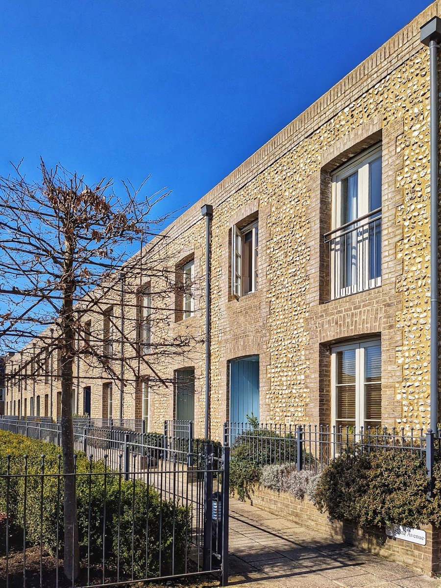 New builds by <a href="/BenPentreath/">Ben Pentreath</a> in Chichester. Note how the windows are set back from the wall plane, creating a sense of depth and solidity. Knapped flint with brick 'dressings'; sound proportions; careful detailing on the arches, railings and doors. Simple but very pleasing.