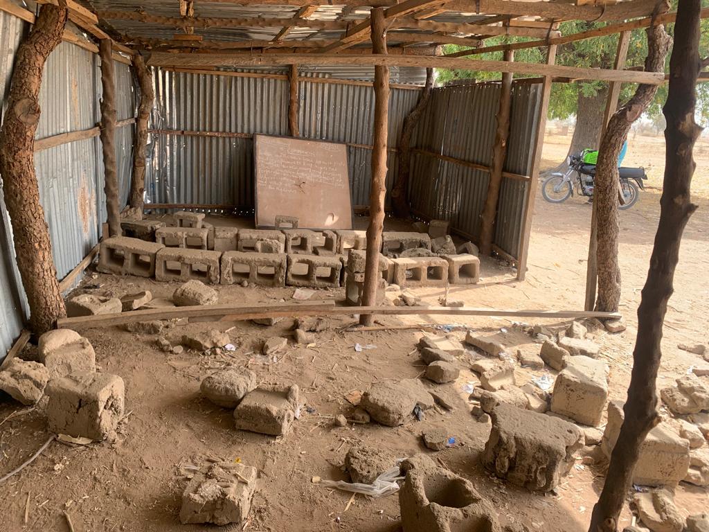 TrackaNG's tweet photo. SHOCKING!!!

In a govt primary school in Gombe, children are sitting under a tree shade/zinc shed to learn.

They also miss out on a full term as they can't go to school during the rainy season. @HonVMD 

Read the story here:👇

https://t.co/dECasJPjRz https://t.co/hpllGTIT5e