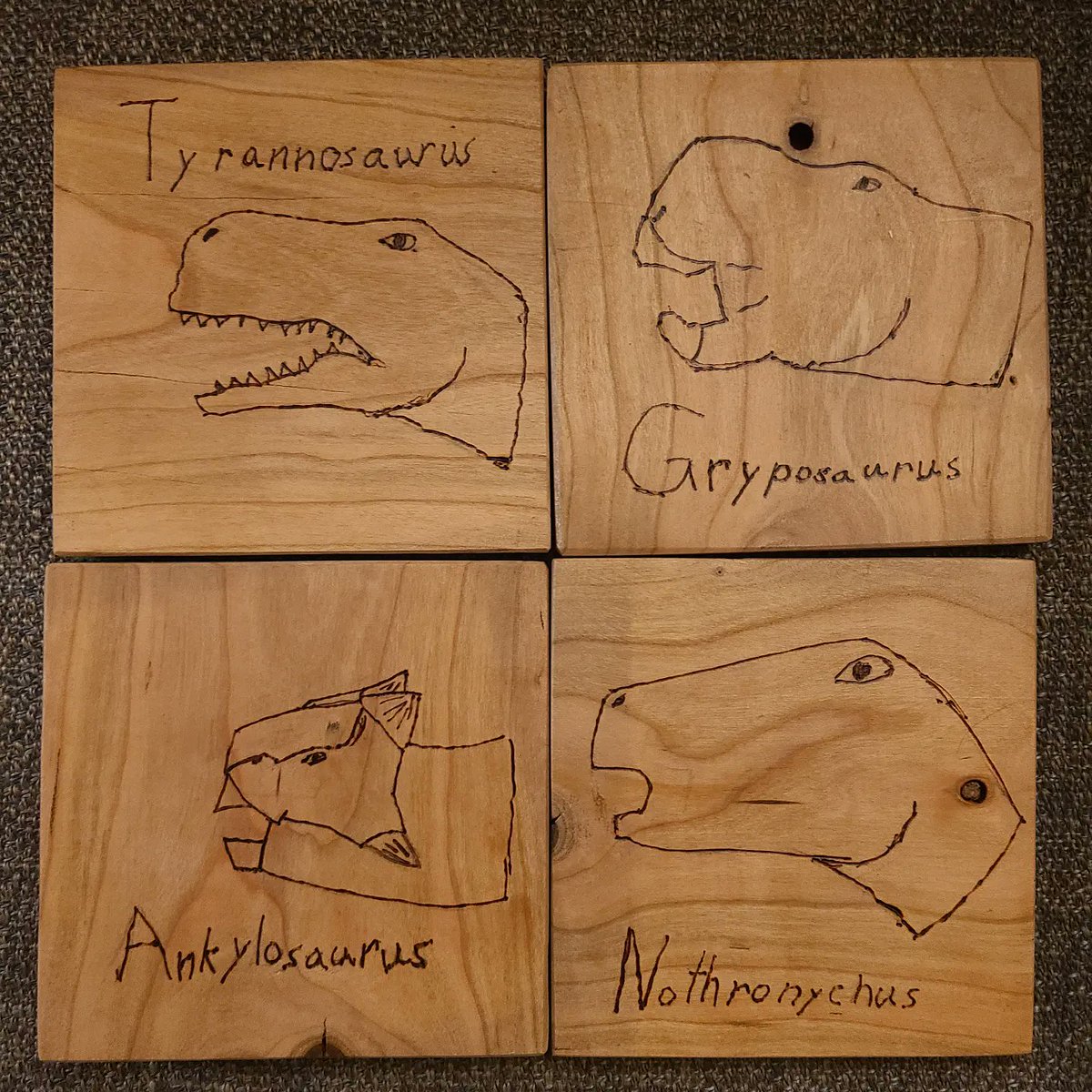 ThatDeeSnow's tweet photo. Look at these beautiful dino-themed coasters my kiddos made for me! I love it when they work together to create! Middle schoolers rock!

#momlife #woodburning #kidcrafts #siblings https://t.co/nQzdtN1rzS