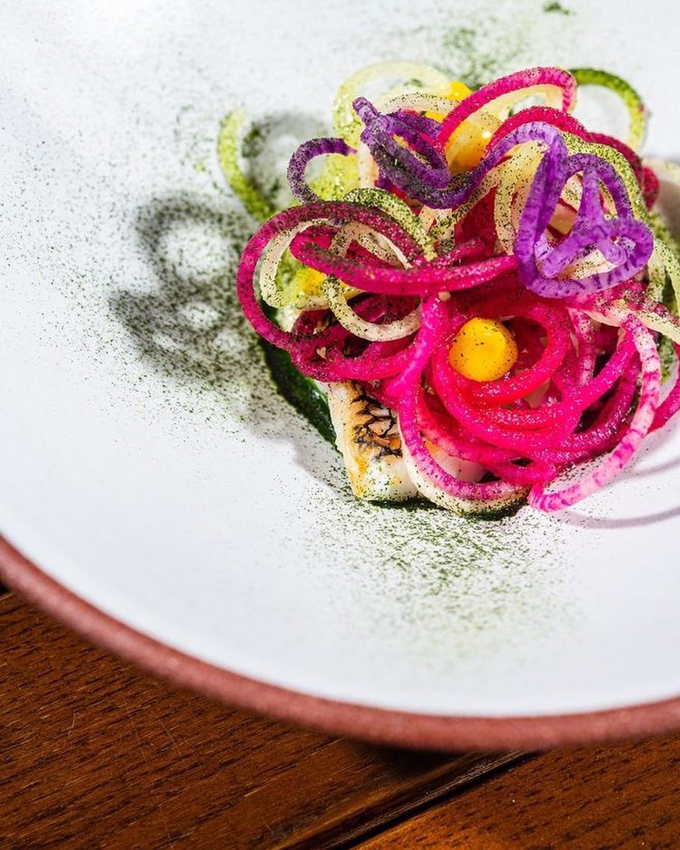 Local Winter radishes, preserved ramps, koji, and dill. 

Light and crisp, this collection of vegetables is served on top of locally-sourced grilled black bass: