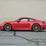 PorscheMarket's tweet photo. This 2020 #Porsche 911 Carrera 4S is finished in the classic Guards Red over a Black leather interior. It's wheels are painted in Satin Aurum and it is equipped with the Sport Design Package. #PorscheMarketplace

▶️ https://t.co/53S7DGgfco https://t.co/5qjjlXm5aI